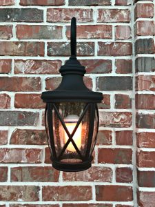 We love this beautiful Allen + Roth Rubbed Bronze and Seeded Glass Front Porch Light. It
