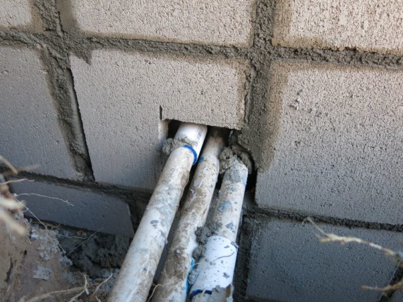 irrigation lines in block wall