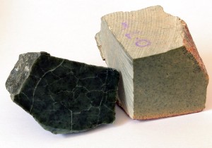 Two colors of soapstone, dark green and light brown versions.